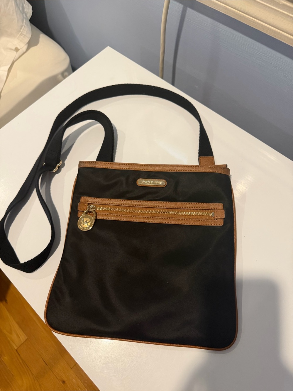 Michael Kors Black and Tan Crossbody Bag with Gold Hardware